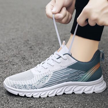 Чоловічі кросівки для бігу та занять спорту: комфорт та стиль. Бігові кросівки для бігу, тенісу, фітнесу, вуличної біганини. Чорно-білі кросівки (40 EU, Entenei Blau)