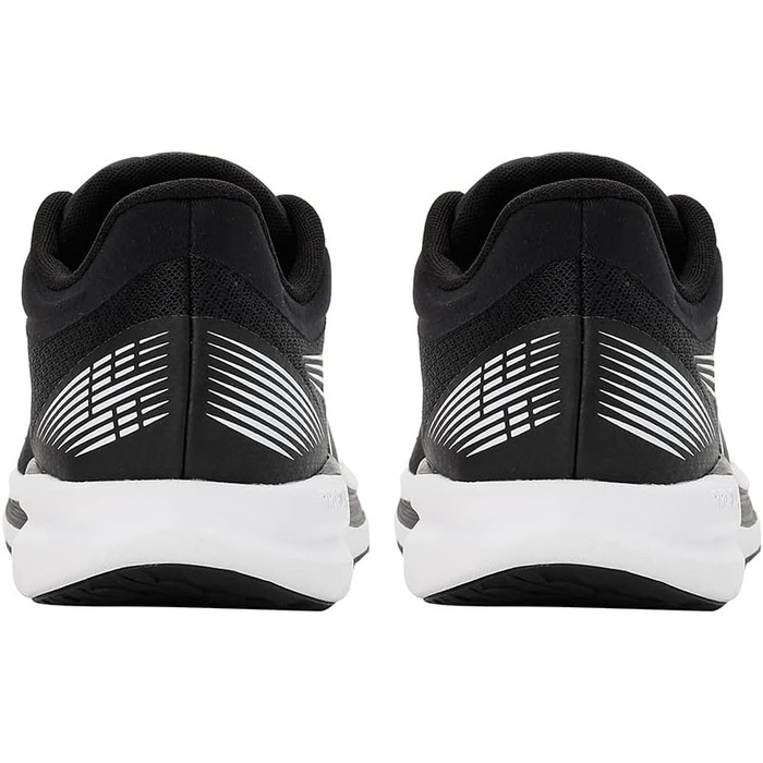 Кросівки футбольні PUMA Unisex Redeem Profoam, 40.5 EU, Puma Black/Puma White