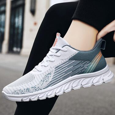 Чоловічі кросівки для бігу та занять спорту: комфорт та стиль. Бігові кросівки для бігу, тенісу, фітнесу, вуличної біганини. Чорно-білі кросівки (40 EU, Entenei Blau)